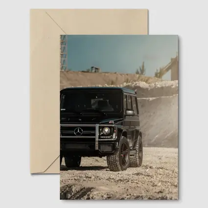 Mercedes G Wagon Black on Sandy Ground