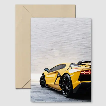 Lamborghini Aventador Yellow Against Concrete Wall