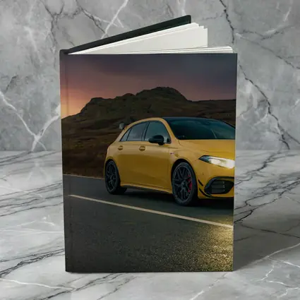 Mercedes AMG Yellow Hatchback Moody Highland Road