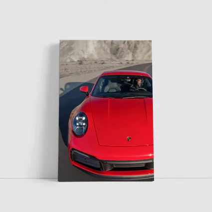 Red Porsche 911 on Mountain Road
