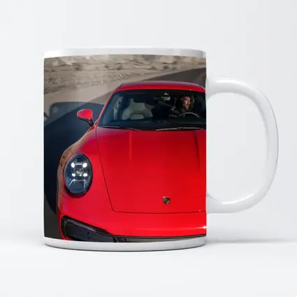 Red Porsche 911 on Mountain Road