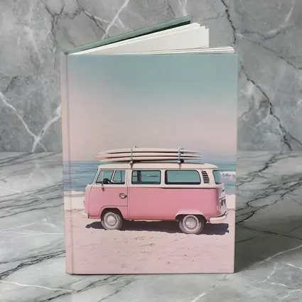 Pink Volkswagen Bus Parked On Beach
