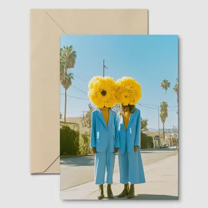 Two Women Yellow Flowers Blue Suits Street