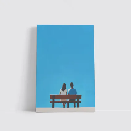 Couple Sitting On Bench Blue Sky