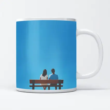 Couple Sitting On Bench Blue Sky