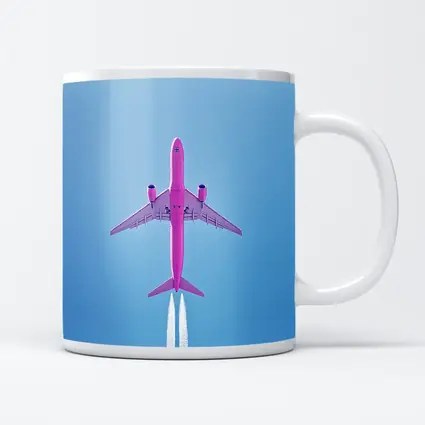 Pink Airplane Flying Against Blue Sky