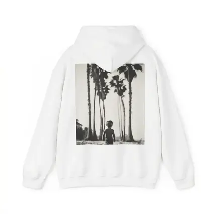 Boy Walking on Beach Among Palm Trees