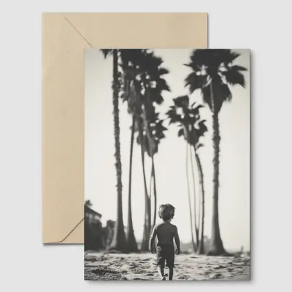 Boy Walking on Beach Among Palm Trees