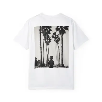 Boy Walking on Beach Among Palm Trees
