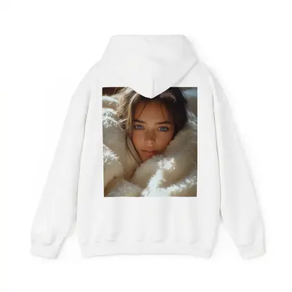 Young Woman Wrapped In Cozy White Blanket