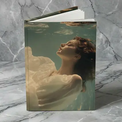 Woman Floating Underwater White Flowing Dress