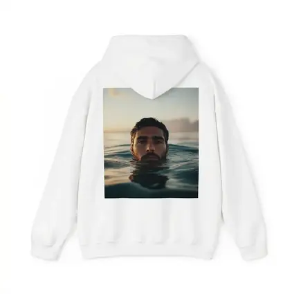 Man Emerging From Ocean At Sunset
