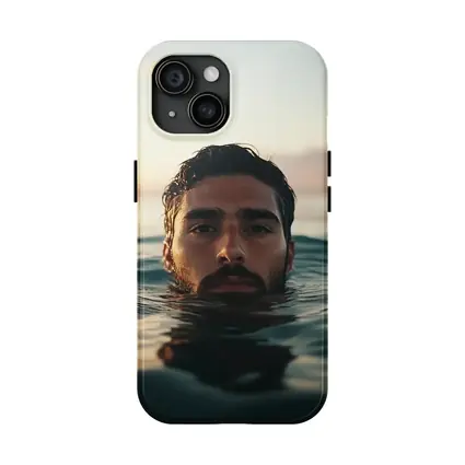 Man Emerging From Ocean At Sunset