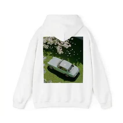 Mint Classic Car Parked Under Blooming Trees