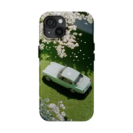 Mint Classic Car Parked Under Blooming Trees