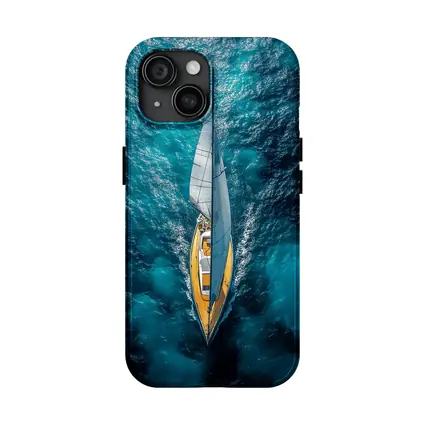Aerial Sailboat Gliding Over Deep Blue Ocean