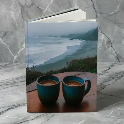 Two Coffee Mugs Foggy Coastal Beach View