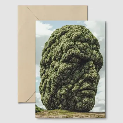 Giant Green Face Sculpture Sky Background
