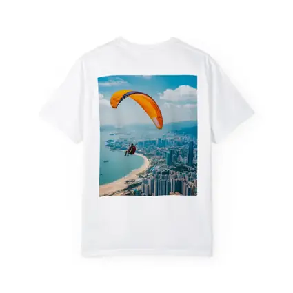 Paraglider Soaring Over Coastal City Skyline