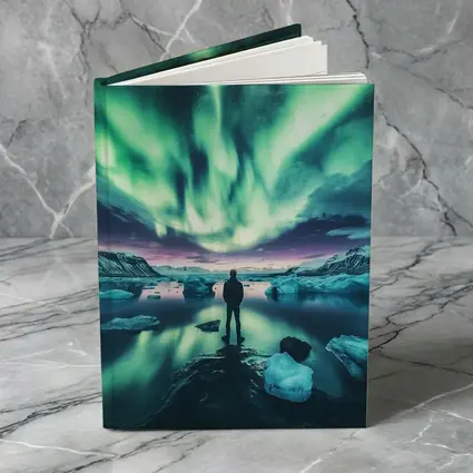 Man Standing Under Northern Lights Iceland
