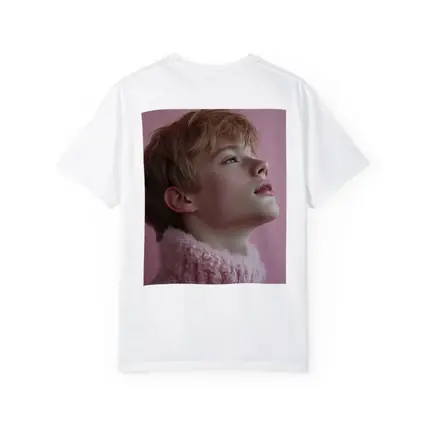 Young Boy Looking Up Pink Background