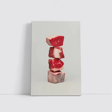 Stacked Raw Beef Cuts Gray Background