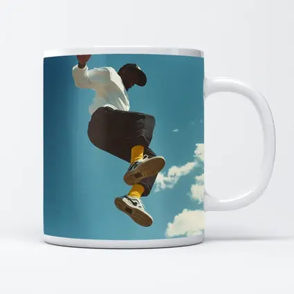 Man Jumping High Against Blue Sky