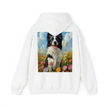 Border Collie Dog Sitting In Wildflower Field