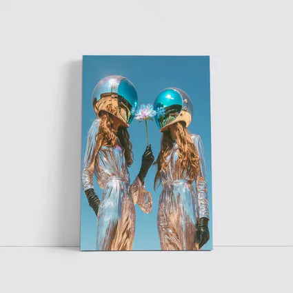 Two Women Astronaut Helmets Silver Suits Sky