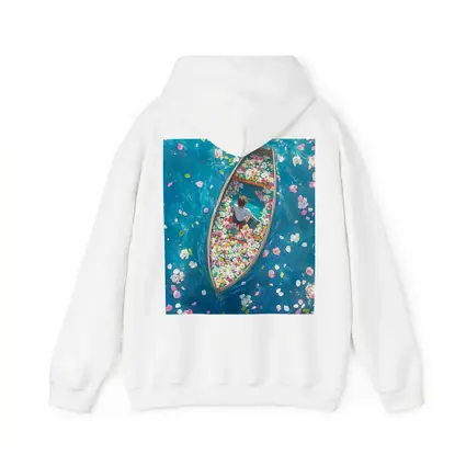 Person Sitting In Flower Filled Boat