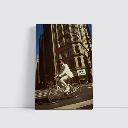 Man in White Suit Cycling New York City