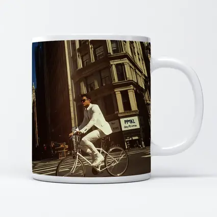Man in White Suit Cycling New York City
