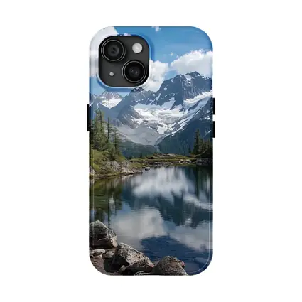 Alpine Lake Reflecting Snow Capped Mountains