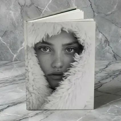 Young Woman Framed in Fluffy White Hood