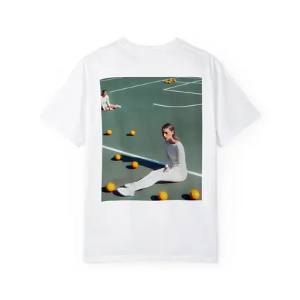 Woman Sitting On Green Tennis Court