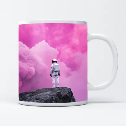 Astronaut Standing On Rock Pink Sky