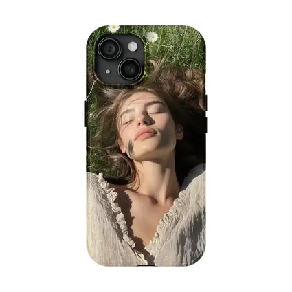 Young Woman Lying in Daisy Flower Field