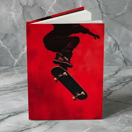 Skateboarder Doing Trick On Red Background
