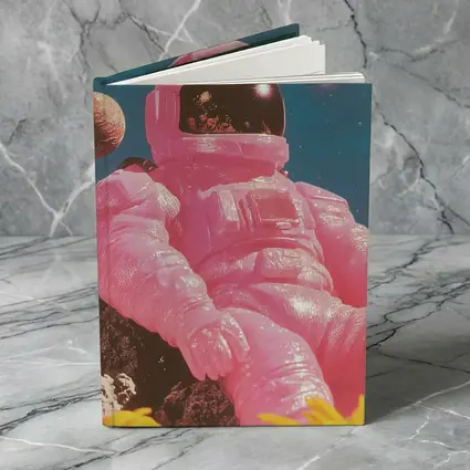 Pink Astronaut Sitting On Moon Surface