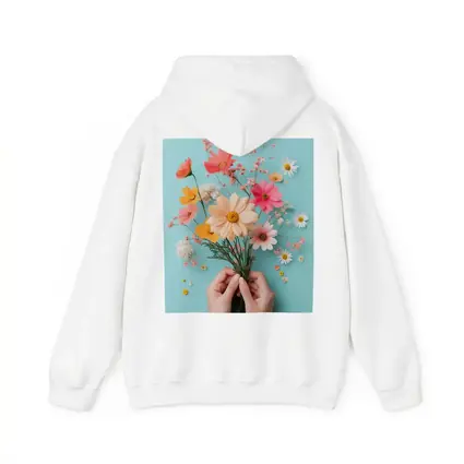 Hands Holding Wildflowers on Blue Background