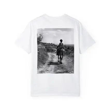 Boy Riding Donkey On Rural Path