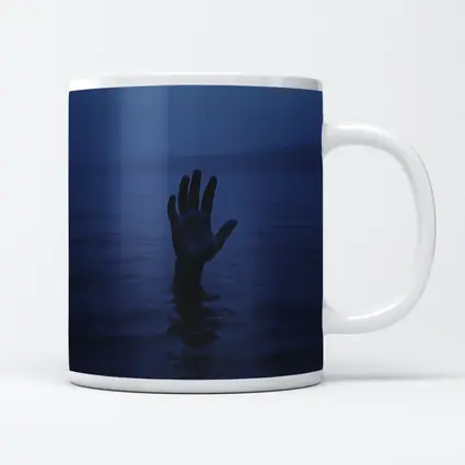 Hand Reaching From Dark Blue Ocean Water