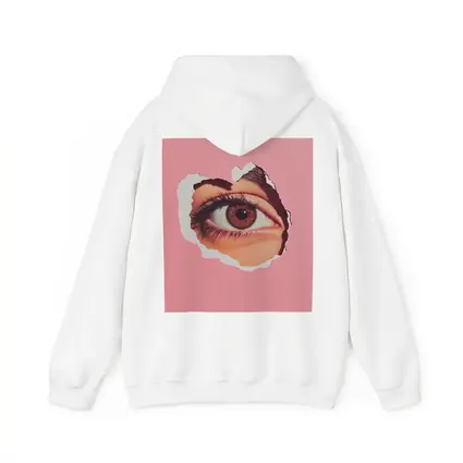 Brown Eye Peering Through Torn Pink Paper