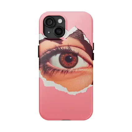 Brown Eye Peering Through Torn Pink Paper