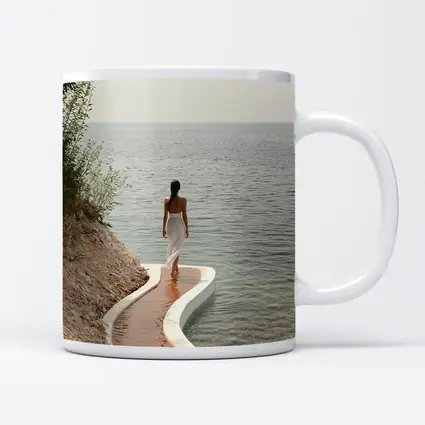 Woman Walking Curved Coastal Path Ocean View