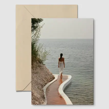 Woman Walking Curved Coastal Path Ocean View