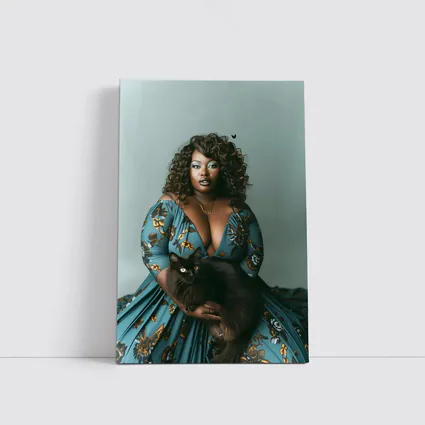 Woman in Blue Floral Gown Holding Black Cat