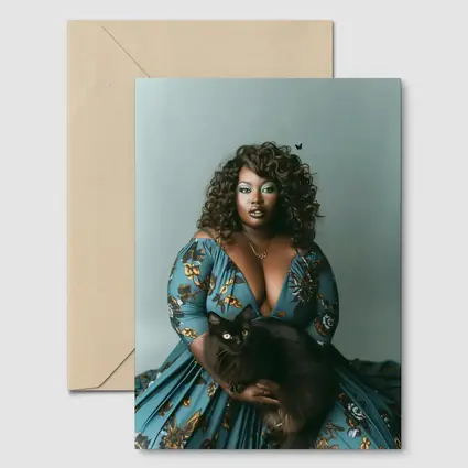 Woman in Blue Floral Gown Holding Black Cat