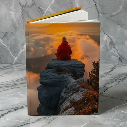 Meditating Person On Rocky Cliff Golden Sunset