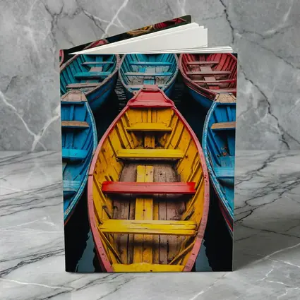 Colorful Wooden Rowing Boats on Water